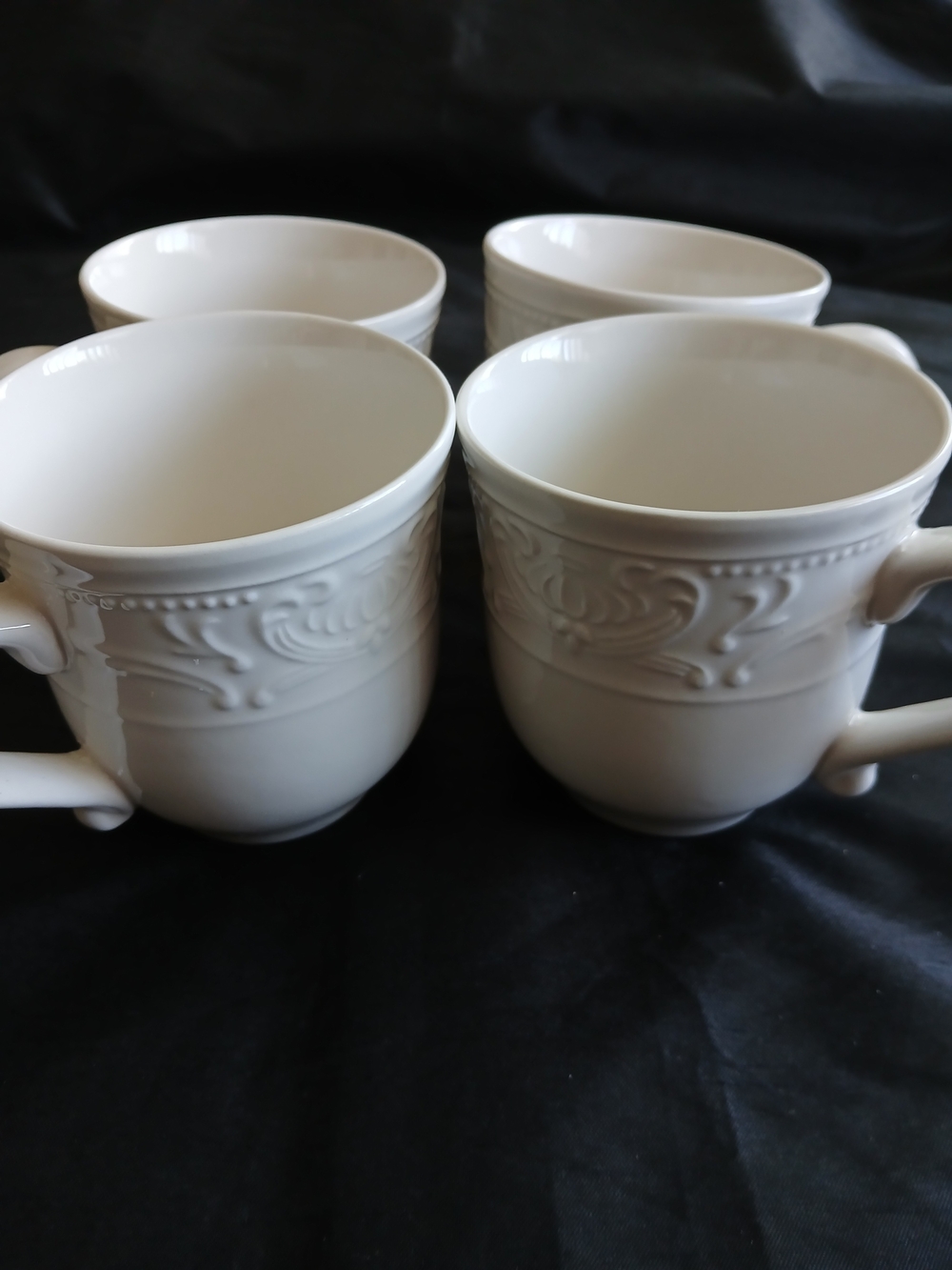 Elegant White Ceramic Vera White Mug Set with Embossed Scroll Detail - Set of 4